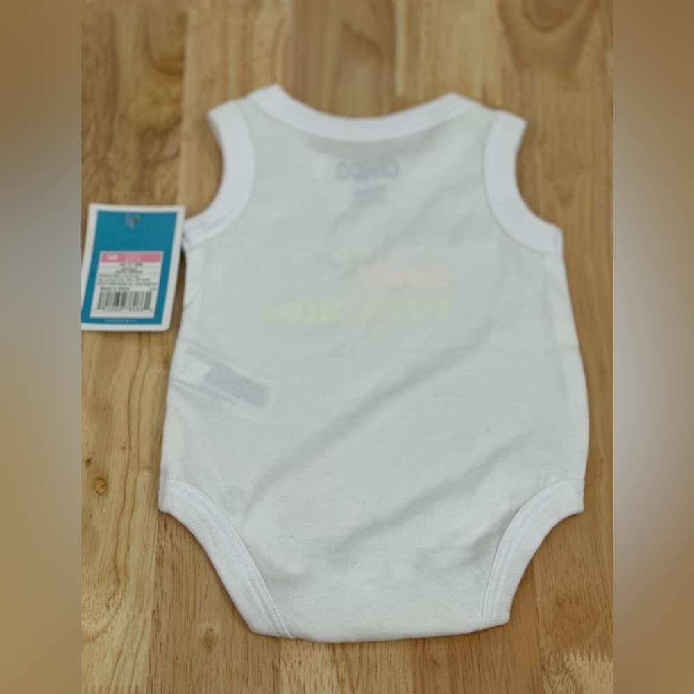 White Baby Onesie with Colorful “My Mom Is Cooler Than Your Mom” - Picture 2 of 3